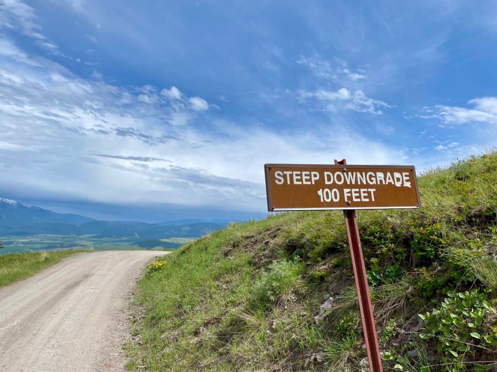 Sign for Steep Downgrade