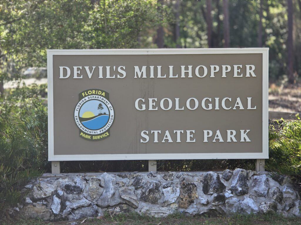 Devils Millhopper Geological State Park Entry Sign